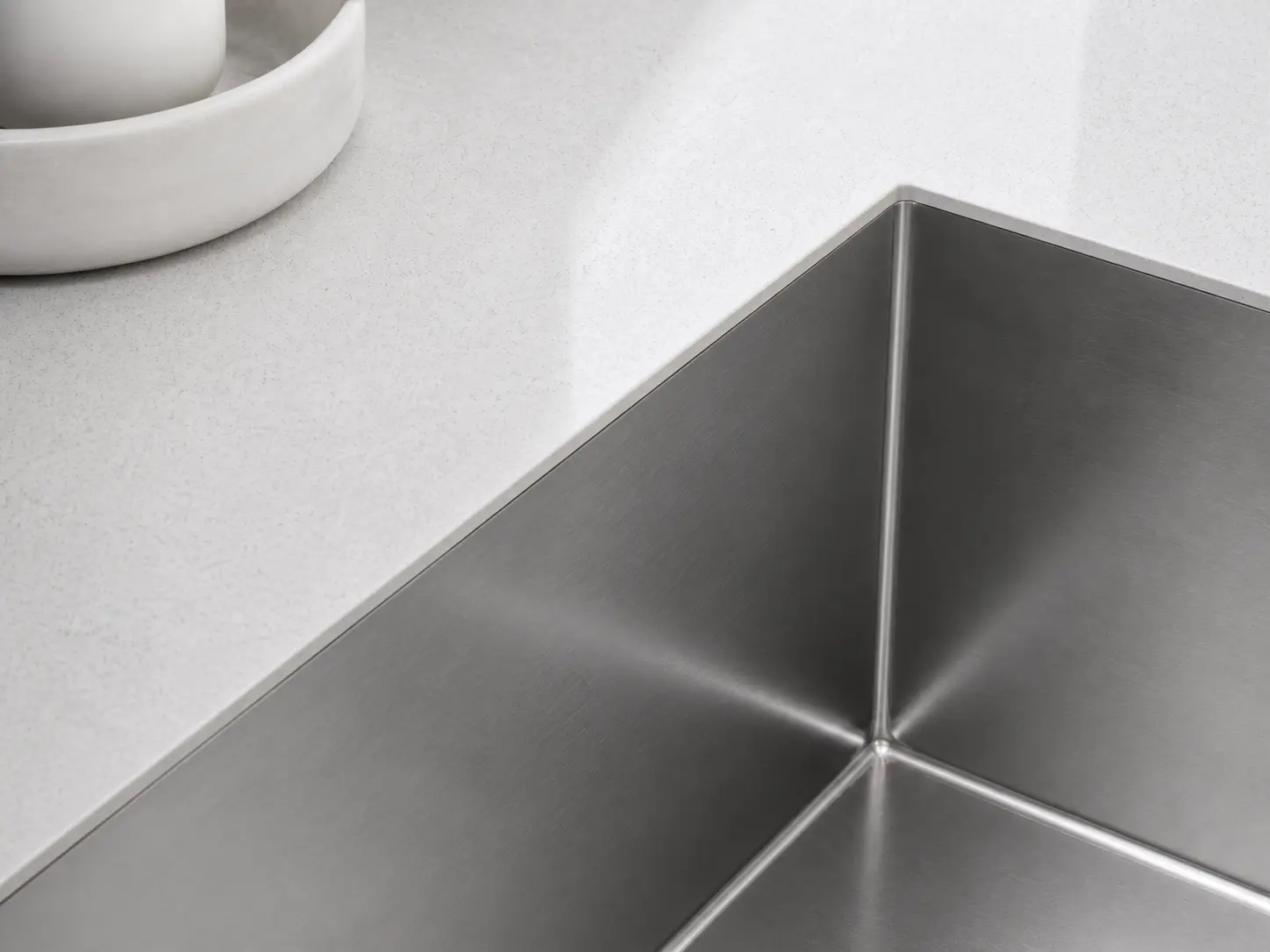 Small R corner detail on handmade workstation sink